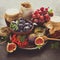 Harvest set: plums, grapes, figs, viburnum berry, walnuts, honey and jam glasses