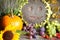 Harvest Thanksgiving autumn fall background with happy sunflower fruits and vegetables