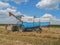 harvest time, combines the field to gather the wheat