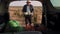 Harvest Time in the Countryside An Aged Farmer Walking with a Crate of Fresh Vegetables