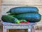 Harvest zucchini on the porch of a country house