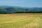 Harvested fields, rolling terrain