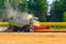 Harvester combine harvesting wheat