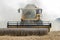 Harvester in corn field