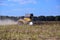 Harvester for harvesting sunflower crop