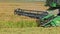 Harvester machine to harvest rice field working in Albufera