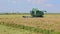 Harvester machine to harvest rice field working in Albufera