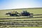 Harvesting hay traktor work on field