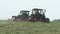 Harvesting herb with a farming tractor