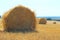 Harvesting, rural, farming concept. Hay on a field. Shot of straw bales on a farm.