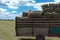 harvesting trailer tractor and farmer