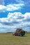 harvesting trailer tractor and farmer