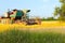 Harvesting in Ukraine combine harvester mows wheat in the field