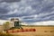 Harvesting under a threatening sky