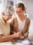 This has been in our family for generations. Cropped shot of a senior woman giving her daughter a pearl necklace.