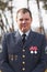 He has earned his medals. Cropped portrait of a high ranking military official standing outside.