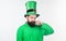 He has got perfect mustache. Bearded man celebrating saint patricks day. Irish man with beard twirling mustache in green