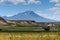 Hasan mountain with grass field