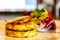 Hashbrown potato patties are served with salad