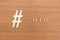 Hashtag sign and 2019 inscription on wooden surface