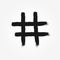 Hashtag symbol drawn by hand with rough brush. Isolated icon, sign, logo.