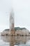 Hassan II Mosque in Casablanca Morocco, on a rainy and foggy day in a Moroccan city.