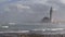 Hassan Mosgue with waves and shore in foreground