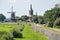 Hasselt windmill, church and seadike