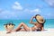 hat bikini woman tanning relaxing on beach