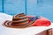 Hat and towel on sunbed