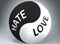 Hate and love in balance - pictured as words Hate, love and yin yang symbol, to show harmony between Hate and love, 3d