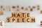 Hate speech - words from wooden blocks with letters