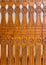 HATEG, ROMANIA - Jul 12, 2020: carved wooden fence with traditional motifs at the Prislop Monastery