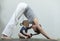 Hatha yoga fitness mother with baby.