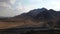 Hatta mounains and the city sign in Hajar mountains in the enclave of Dubai in the UAE