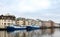 Haugesund, Norway - January 9, 2018: View of the city of Haugesund from the canal. Two ships at the quai.