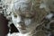 A haunted doll with cracked porcelain and a ghostly presence Old mystical scary horror doll