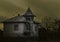 Haunted house with dark horror atmosphere and full moon. Creepy old mansion at night. Spooky scene like in frightening movies. Sty