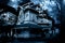 Haunted house. Old abandoned house in the night forest