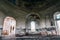 Haunted mansion, abandoned ancient building inside interior with arch windows