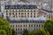 Haussmannian building facades and mansard rooftops in summer. Paris. France