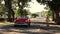 Havana, Cuba - 20171121 - Classic America Cars Drives Next to Wheelbarrow.