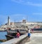 HAVANA, CUBA - APRIL 1, 2012: Native fishermen in front of Moro castle