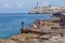 HAVANA, CUBA - APRIL 1, 2012: Teenagers swimming near Moro castle