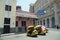 Havana, Cuba, circa May 2022: modern yellow cocotaxi at floridita bar