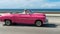 HAVANA, CUBA - OCTOBER 20, 2017: Moving Old Car in Malecon, Havana. Cuba. Public Taxi