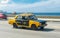 HAVANA, CUBA - OCTOBER 20, 2017: Moving Old Car in Malecon, Havana. Cuba. Public Taxi. Lada Vehicle