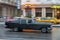 HAVANA, CUBA - OCTOBER 21, 2017: Old Style Retro Car in Havana, Cuba. Public Transport Taxi Car for Tourist and Local People. Blac