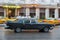 HAVANA, CUBA - OCTOBER 21, 2017: Old Style Retro Car in Havana, Cuba. Public Transport Taxi Car for Tourist and Local People. Blac