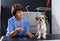 Havanese getting haircut by female groomer